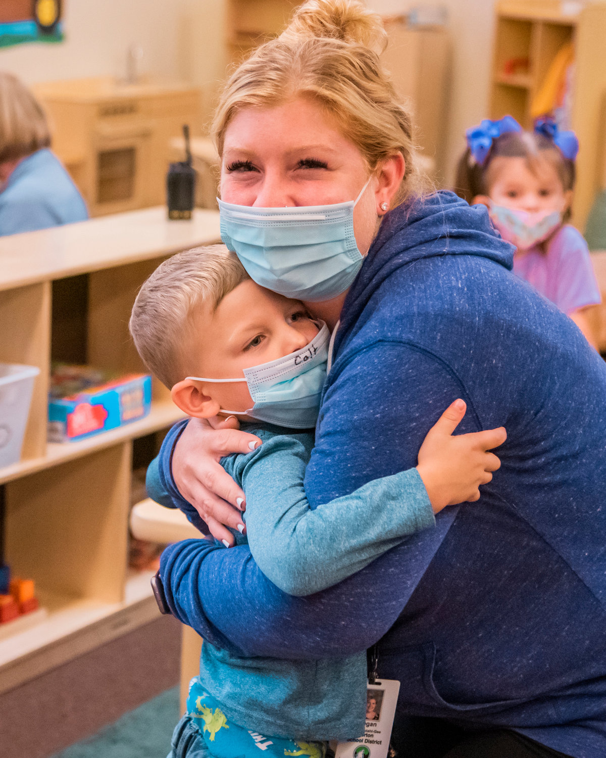 Colt, a student in the Morton Elementary School Transitional Kindergarten program asks for a hug from Megan Brenenstahl-Gee, with the Morton School District, during class Thursday afternoon.